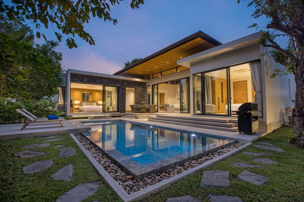 Villa Luma Botanica, garden and pool at twilight, Bang Tao Phuket