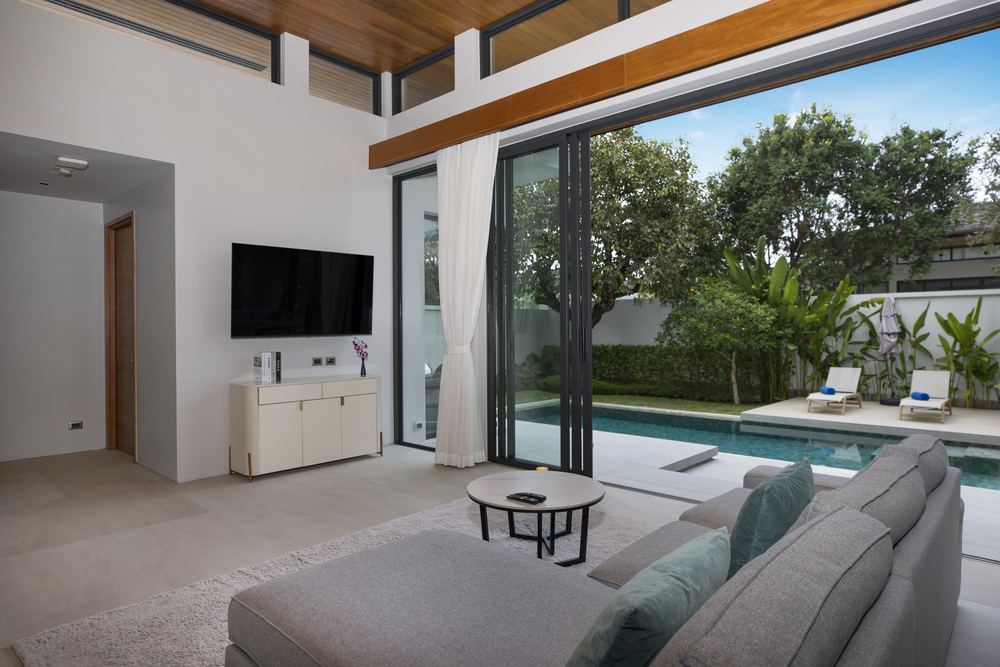 Villa Luma Botanica, living room opening to the pool, Bang Tao Phuket