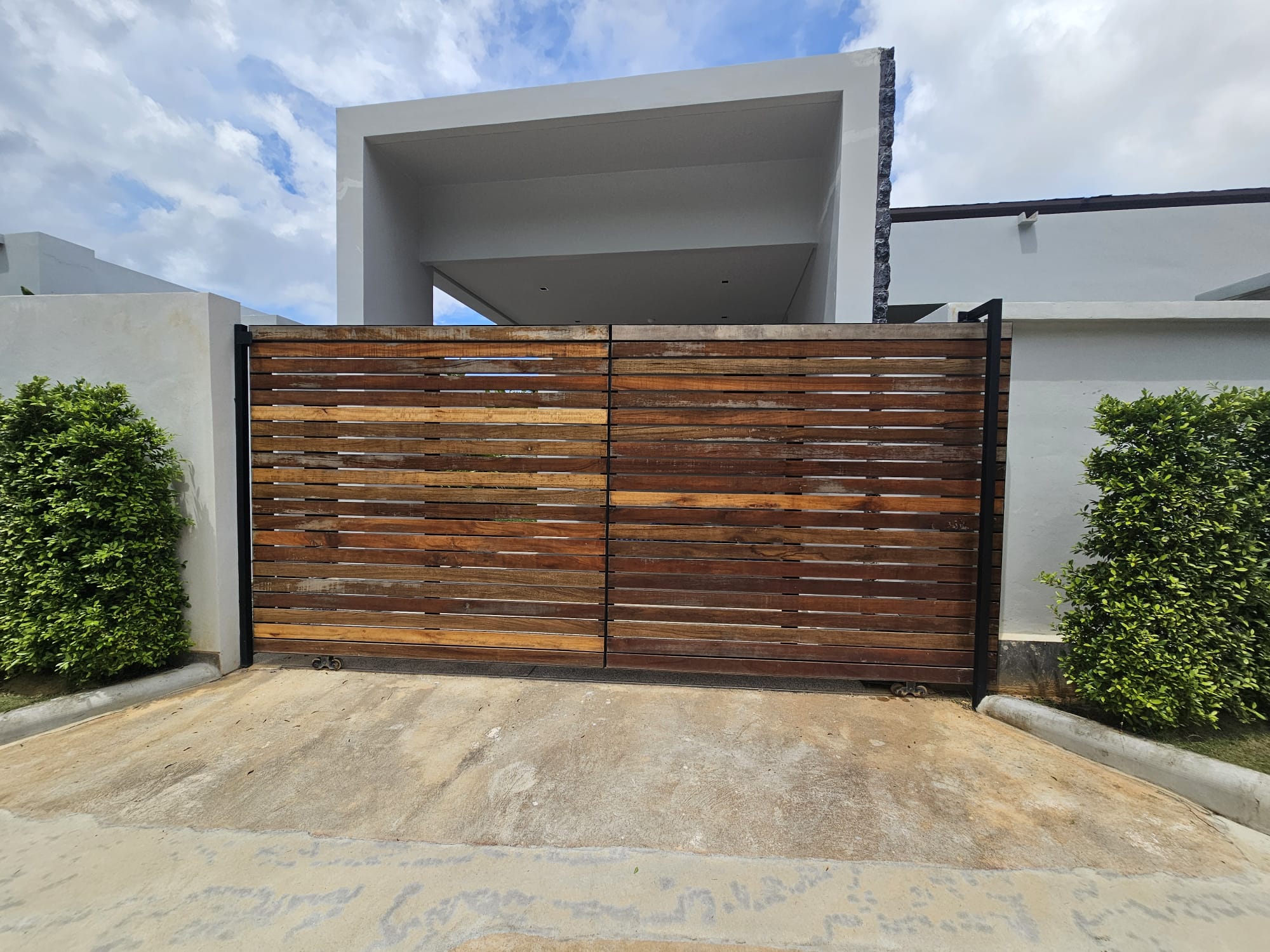 Villa Luma Botanica master en-suite bathroom with freestanding bath and glass rain shower
