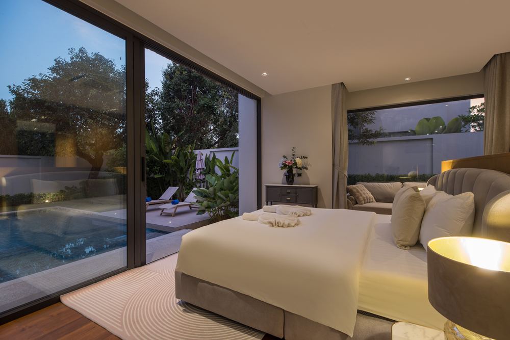 Villa Luma Botanica, master suite at dusk, Bang Tao Phuket