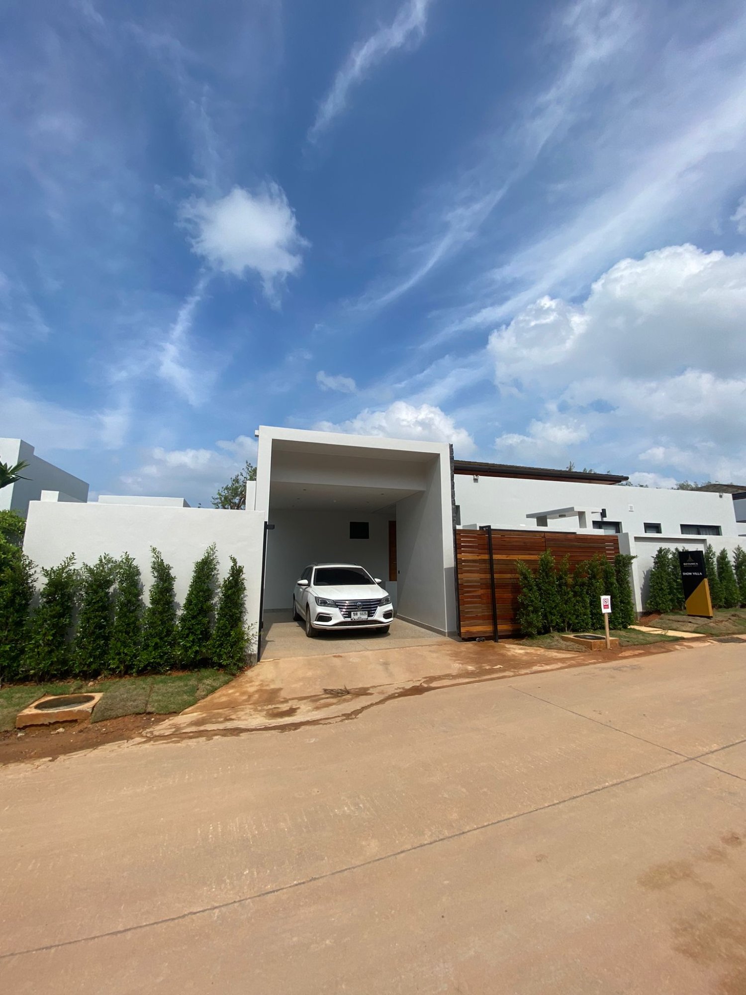 Villa Luma Botanica private swimming pool with sun loungers and lush tropical garden, Bang Tao Phuket